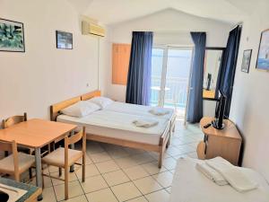 Postel nebo postele na pokoji v ubytování Guesthouse Villa Paškal