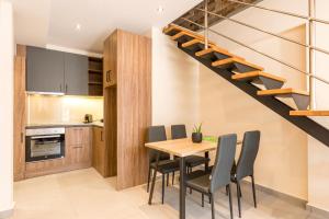 Kuchyňa alebo kuchynka v ubytovaní Urban Lofts