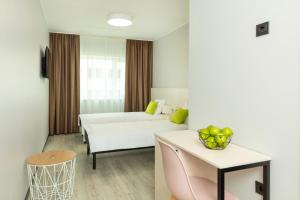 Postel nebo postele na pokoji v ubytování U11 Hotel & SPA + 37 fotografií