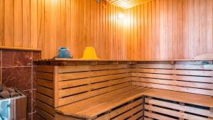 a wooden sauna with two ducks on the ledge at Villa Bonne Maison in Alushta