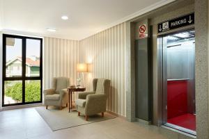Posezení v ubytování Hotel Piedras