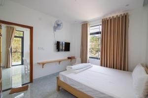 Giường trong phòng chung tại Relax hotel