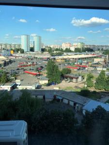 a view of a parking lot in a city at Сдам посуточно однакомнатную квартиру in Kharkiv