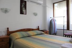 Postel nebo postele na pokoji v ubytování Radik Guest Rooms