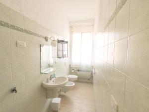Kúpeľňa v ubytovaní Appartamento Little Italy + 10 fotografií