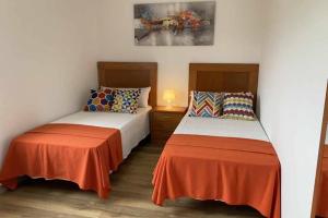 Ein Bett oder Betten in einem Zimmer der Unterkunft CASA QUINTEIROS