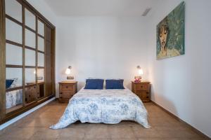 Ένα ή περισσότερα κρεβάτια σε δωμάτιο στο Chalet Acebuche