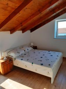 Postel nebo postele na pokoji v ubytování Casa Nonna Tereza