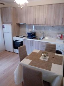 A kitchen or kitchenette at Vacations in Corfu-Antiperni by CorfuEscapes