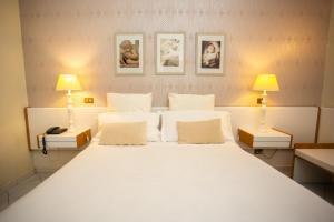 Кровать или кровати в номере Hotel Posta