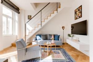 Coin salon dans l'établissement Anděl design duplex, AC, garage