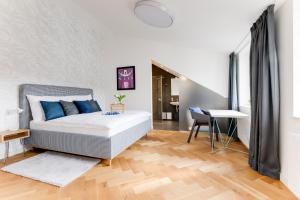 Un ou plusieurs lits dans un hébergement de l'établissement Anděl design duplex, AC, garage