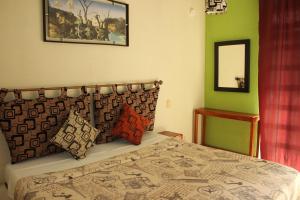 Postel nebo postele na pokoji v ubytování Hotel Cascada Huasteca