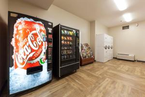 a room with two refrigerators and a soda machine at Extended Stay America Suites - Washington, DC - Alexandria - Landmark in Alexandria