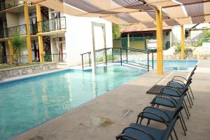 Der Swimmingpool an oder in der Nähe von Hotel Cascada Huasteca