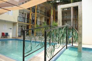 una piscina en un hotel con complejo en Hotel Cascada Huasteca, en Tanchachín