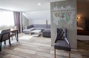 Posezení v ubytování Biplan Hotel