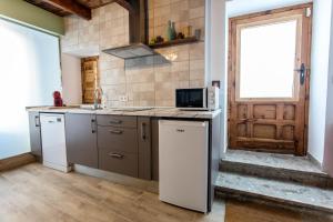 A kitchen or kitchenette at 3 Lienzos