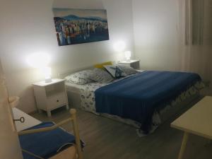 Ein Bett oder Betten in einem Zimmer der Unterkunft Holiday Home Casa Bianca