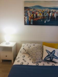 Ein Bett oder Betten in einem Zimmer der Unterkunft Holiday Home Casa Bianca