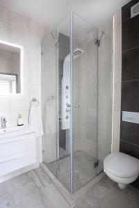 Ett badrum på Trend Apartmanház -Vizslás