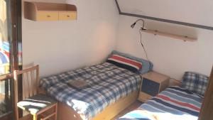 Postel nebo postele na pokoji v ubytování Ático dúplex con vistas