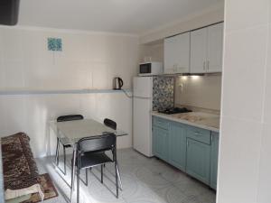 A cozinha ou cozinha compacta de Kokos Elling Guest House