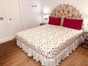 Posteľ alebo postele v izbe v ubytovaní Hostal Casa Arco Iris (Playa)