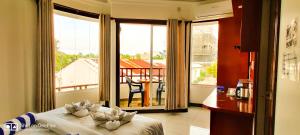 Voodi või voodid majutusasutuse Athens View Hotel toas