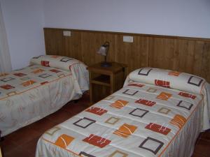 Katil atau katil-katil dalam bilik di Apartamentos Nati II