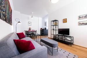 Televízia a/alebo spoločenská miestnosť v ubytovaní Apartment MERAN