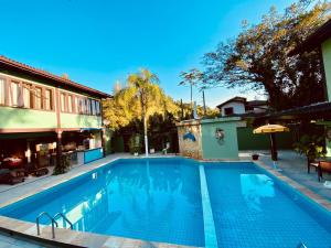 A piscina localizada em Recanto Verde Praia Hotel Juquehy ou nos arredores