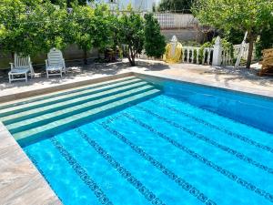 Bazén v ubytování Apartamento en el centro del Albir nebo v jeho okolí