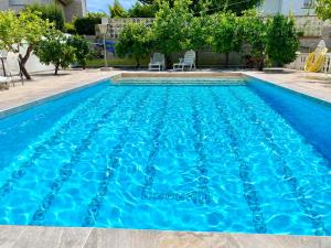 Bazén v ubytování Apartamento en el centro del Albir nebo v jeho okolí