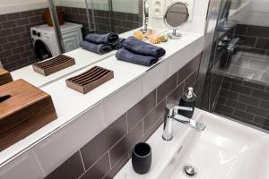 Kúpeľňa v ubytovaní Apartment MERAN + 26 fotografií