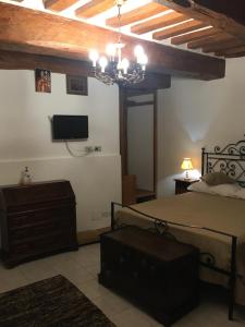 A bed or beds in a room at Affittacamere Mirella