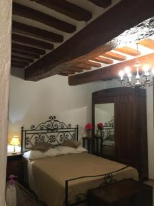 A bed or beds in a room at Affittacamere Mirella