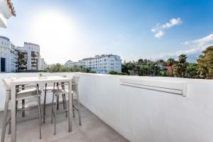 A balcony or terrace at by RIVA - Chic, Contemporary Studio in Puerto Banus Gardens