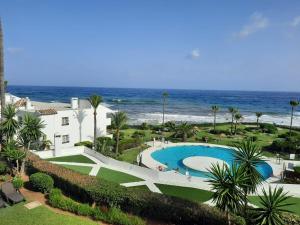 วิวสระว่ายน้ำที่ Miraflores Beach - Playa First Line - Sea view - Luxury & Design Apartment หรือบริเวณใกล้เคียง