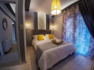 
Ένα ή περισσότερα κρεβάτια σε δωμάτιο στο Family Inn Apartments&suites
