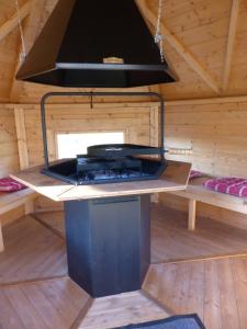 A kitchen or kitchenette at les trois bergers