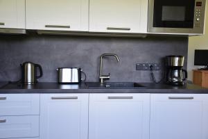 Kuchyň nebo kuchyňský kout v ubytování Apartmán198,cz