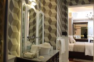 Ванная комната в Hotel Boutique Margarita Toluca