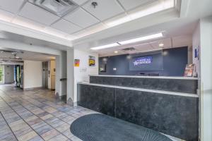 a lobby of a hospital with a reception counter at Americas Best Value Inn-Knoxville East in Knoxville