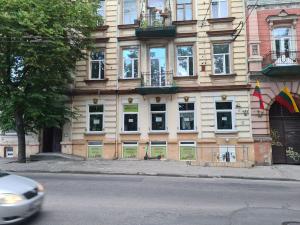 a building on the side of a street at Come to Vilnius hostel Self check in in Vilnius