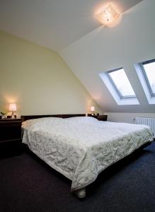 Ένα ή περισσότερα κρεβάτια σε δωμάτιο στο Bona Serva