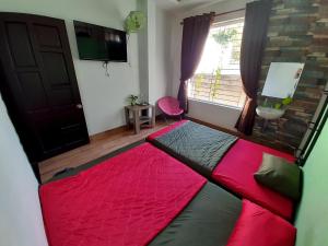 Homestay Xì Trum客房内的一张或多张床位