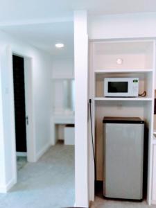 Kuchyň nebo kuchyňský kout v ubytování UTM Hotel & Residence