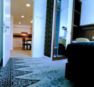 Postel nebo postele na pokoji v ubytování UTM Hotel & Residence
