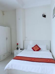 Giường trong phòng chung tại Kim Hương Homestay